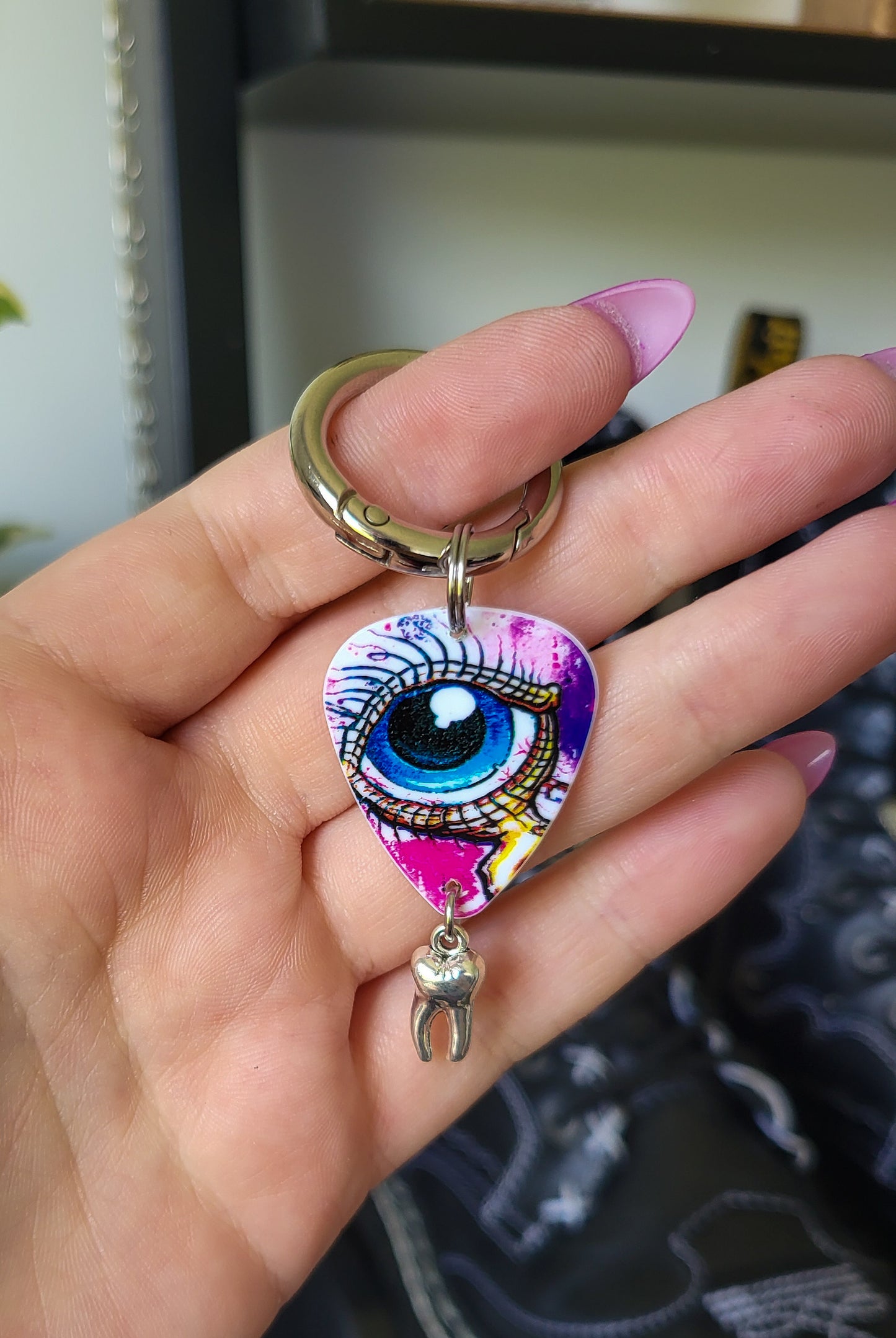 Charm à languette médiator oeil