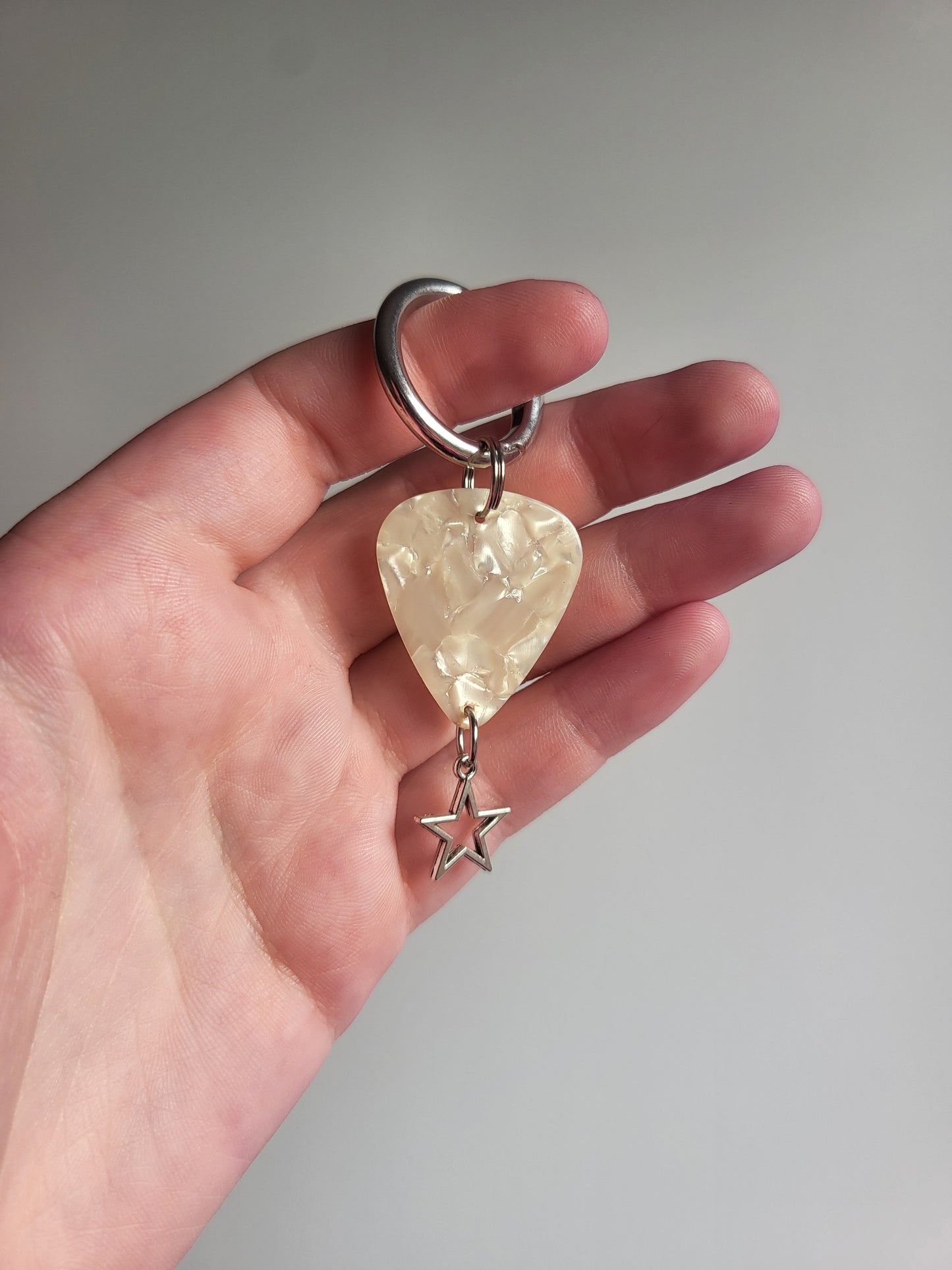 Charm à languette blanc étoile